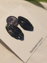 Load image into Gallery viewer, Dúil Black shimmer statement stud earrings | Black earrings | Black jewellery | Polymerclay earrings | Irish made gifts | Irish jewellery | Dúil
