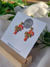 Load image into Gallery viewer, Dúil Dangling candy cane earrings

