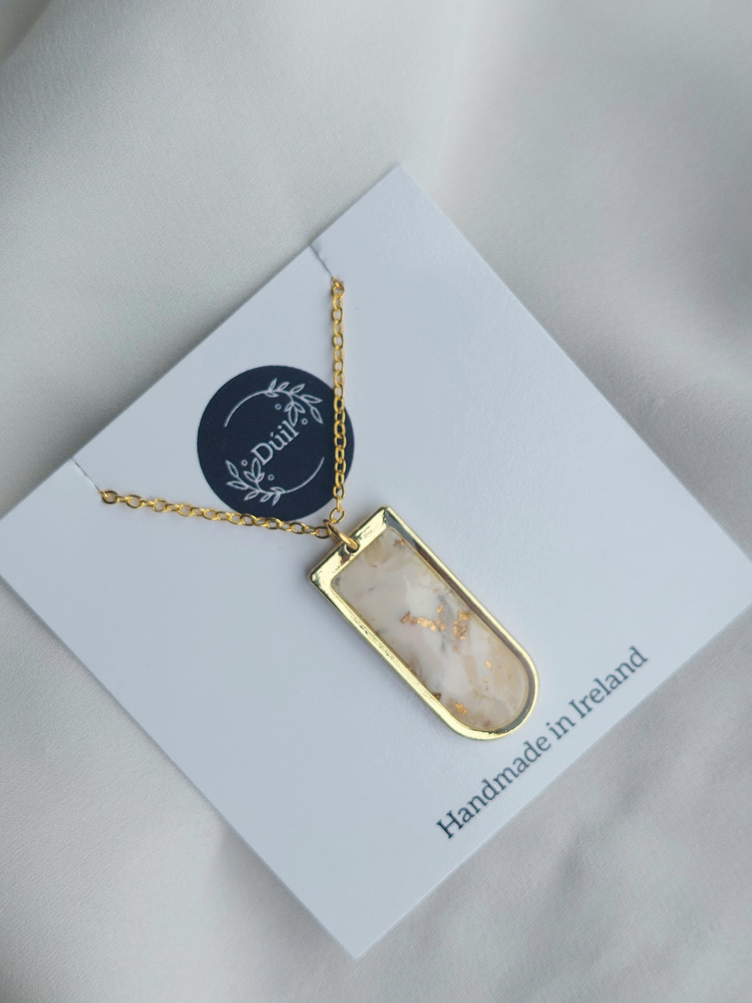 Gold & beige abstract pendant & necklace